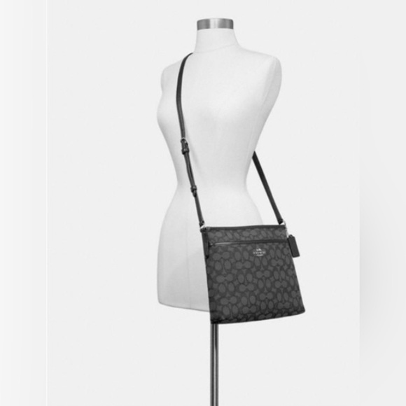 COACH Signature File
Crossbody Canvas F29960 Black/Smoke - Picture 5 of 7